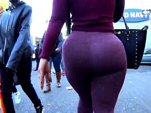Une nana amateur avec un gros cul dans un pantalon violet serré va se