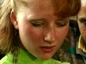 Petite rousse avec des vieux